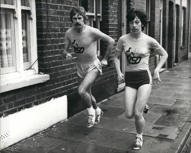 Ian Thompson running in Luton accompanied by wife Margaret. (Image: Keystone Press, Alamy Stock Photo)