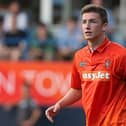 Ex-Hatter Alex Lacey in action for Luton