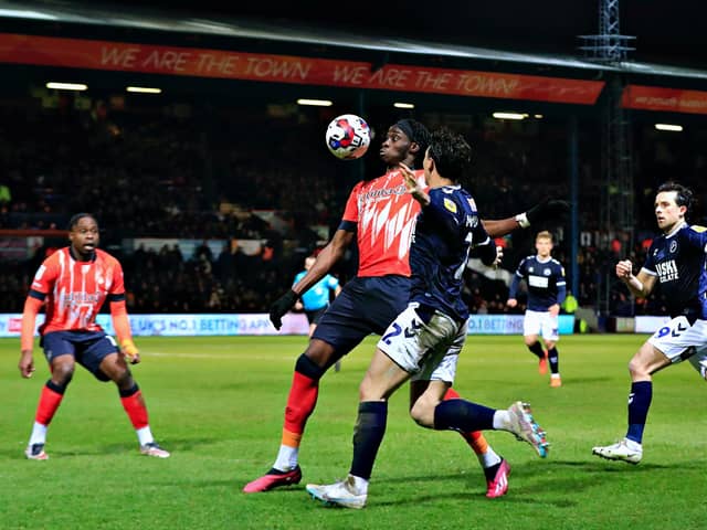 Elijah Adebayo makes his 100th appearance for the Hatters
