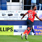 Cameron Jerome wheels away after being involved in Luton's second goal against QPR on Saturday