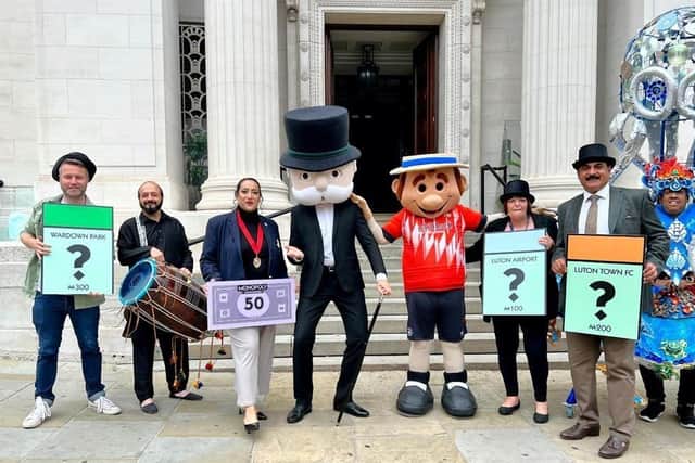 Celebrations outside the town hall as Luton's own version of Monopoly is announced. Pic: Raja Naeem
