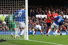 Everton Vitaliy Mykolenko puts through his own net as Luton take the lead at Goodison Park on Saturday - pic: Clive Brunskill/Getty Images