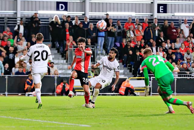 Ryan Giles clears the danger during am early start in the Premier League against West Ham - pic: Liam Smith