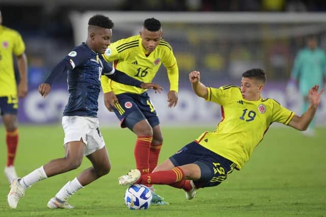 Ecuador's Oscar Zambrano is about to be challenged during his country's South American U20 Championship match with Colombia - pic: DANIEL MUNOZ/AFP via Getty Images