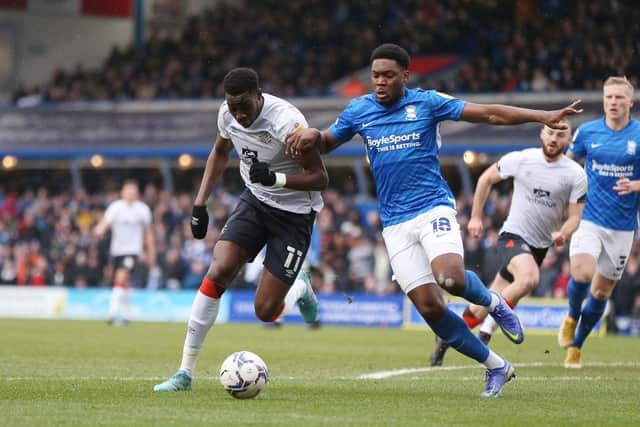 Elijah Adebayo battles for possession at Birmingham last season