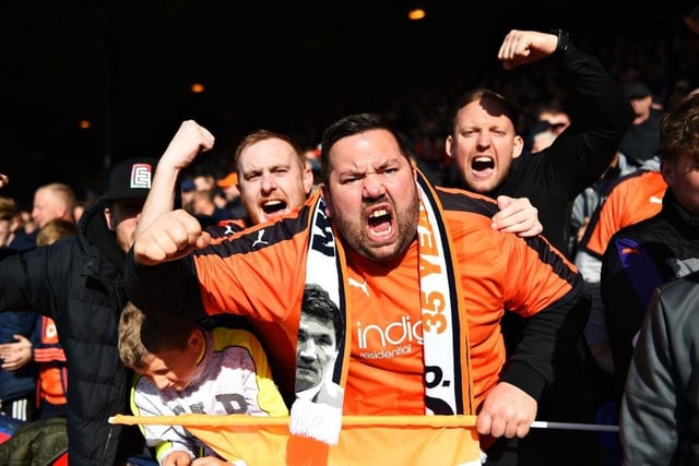 Luton Town fans support their club during the Sky Bet League One match between Luton Town and Oxford United at Kenilworth Road on May 04, 2019.
