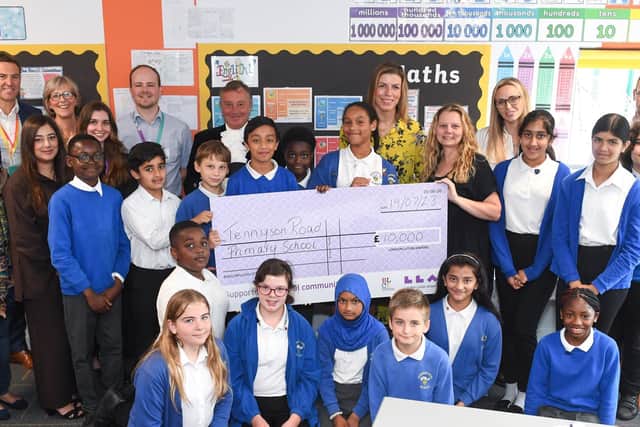 Tennyson Road Primary School receives a cheque for the development of an outdoor learning space from London Luton Airport. Picture: London Luton Airport