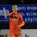 Former Luton midfielder Jake Peck in action for the Hatters back in October 2018