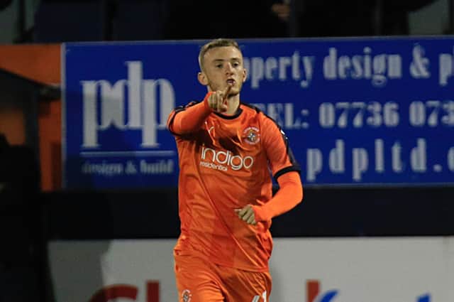 Former Luton midfielder Jake Peck in action for the Hatters back in October 2018