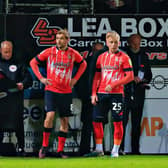 Joe Taylor prepares to come on with Luke Berry against Middlesbrough recently