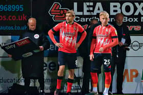 Joe Taylor prepares to come on with Luke Berry against Middlesbrough recently