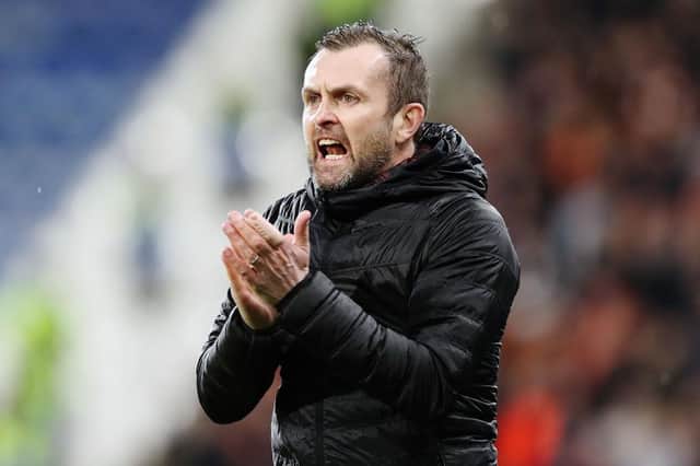 Nathan Jones encourages his players during defeat at Huddersfield this evening - pic: Getty Images