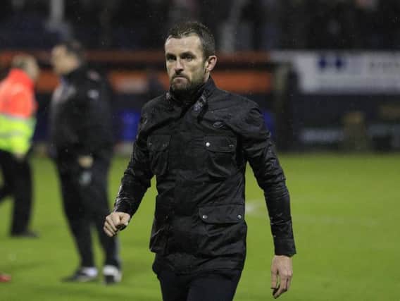 Hatters boss Nathan Jones is stunned after last night's play-off exit