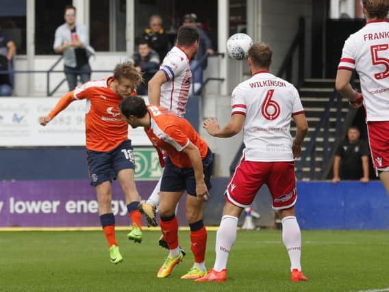 Luke Berry heads home the first goal this afternoon