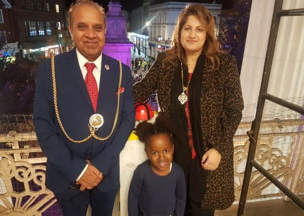 (L-R) Mayor of Luton, Cllr Mohammad Ayub, competition winner Maryam and Cllr Naseem Ayub ready to press the switch to light up Luton