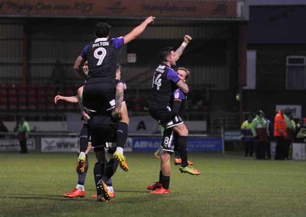 Danny Hylton celebrates Luton's 2-1 win at Crewe on Saturday