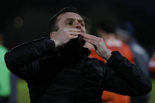 Nathan Jones salutes Town's fans after the final whistle