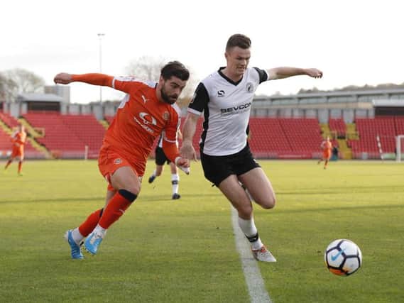 Elliot Lee battles for possession at Gateshead on Sunday