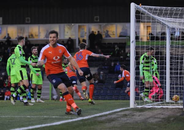 Hatters celebrate their opener at Forest Green on Saturday