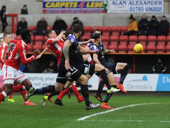 Town go close to an opening goal at Swindon yesterday