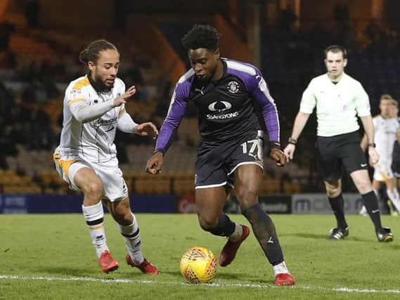 Town midfielder Pelly-Ruddock Mpanzu in action on his recall to the side against Port Vale