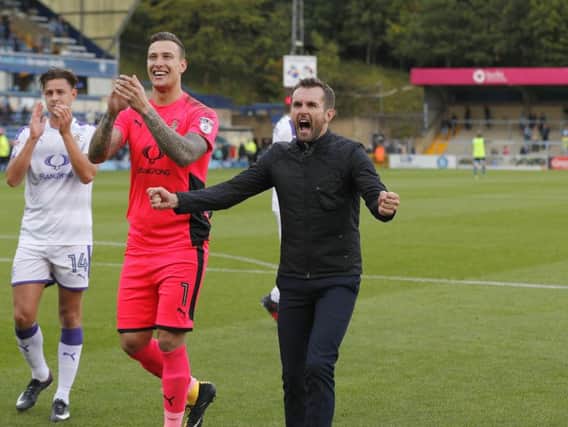 Hatters boss Nathan Jones celebrating a victory at Wycombe earlier this season