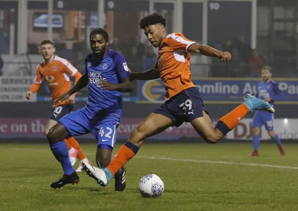 Akin Famewo powers out of defence against Peterborough last night
