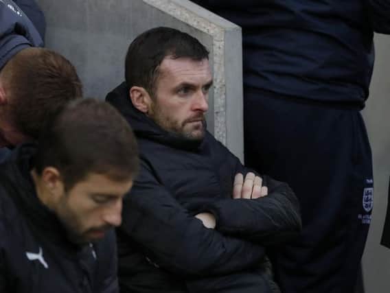 A disappointed Luton boss Nathan Jones looks on at Chesterfield