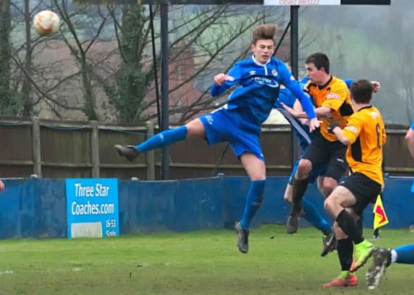 Jack Wood scores for Aylesbury United against Barton - pic: Mike Snell