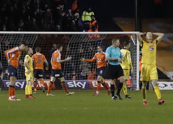 Morecambe are left disappointed by their defeat at Luton