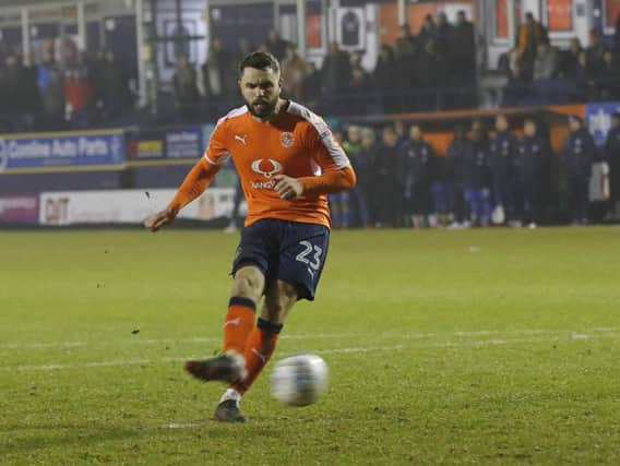 Josh McQuoid scores from the spot in his last appearance for Luton