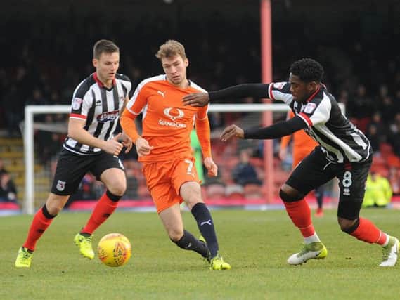 Town defender Jack Stacey in action against Grimsby