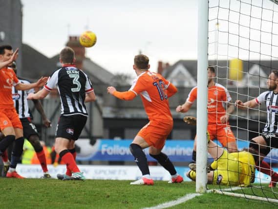Hatters go close during the first half at Blundell Park