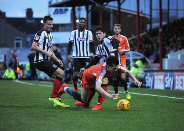 Dan Potts goes over against Grimsby on Saturday