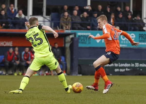 Flynn Downes in action on his Luton debut