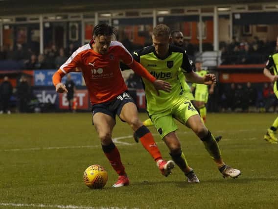 Hatters attacker Harry Cornick in action against Exeter