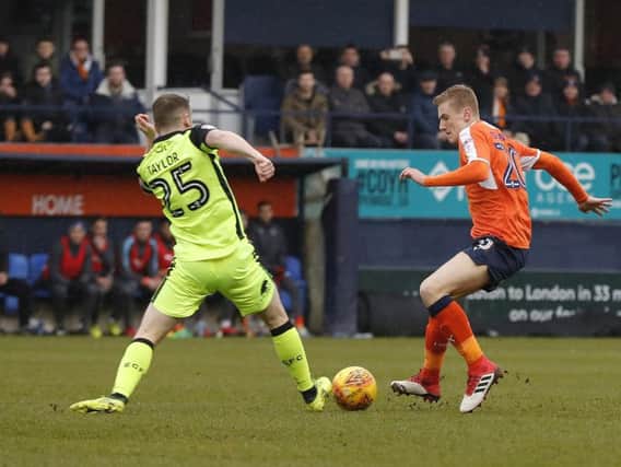 Midfielder Flynn Downes on his debut for the Hatters