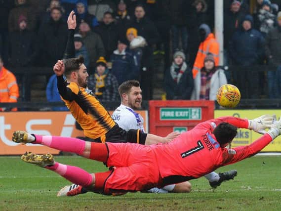 Striker James Collins makes it 1-0 to Luton before being sent off for the Hatters late on