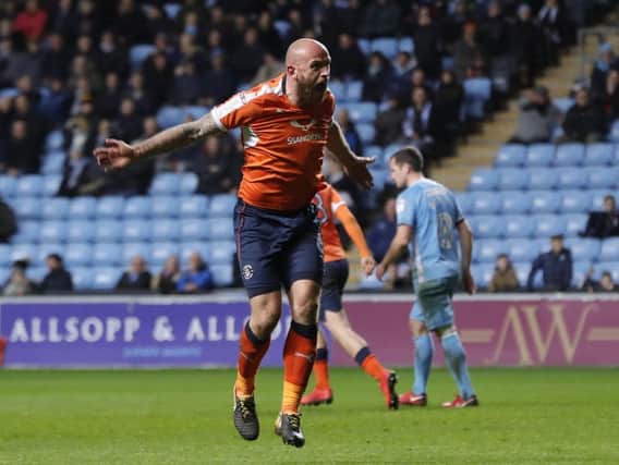 Hatters captain Scott Cuthbert celebrates his goal at Coventry