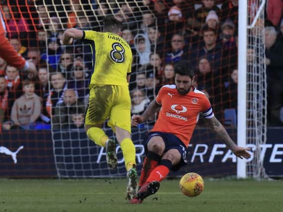 Luton defender Alan Sheehan will make his 100th appearance this evening