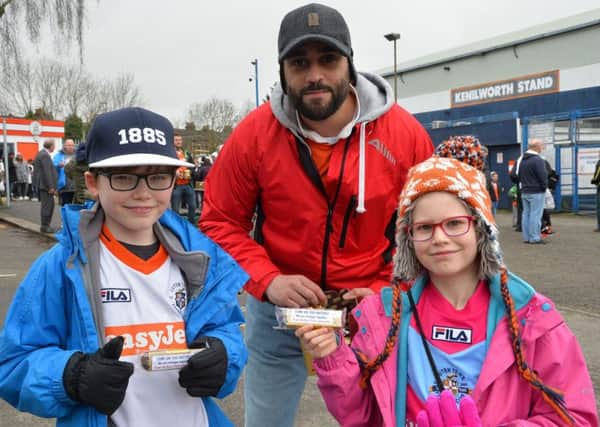 Bury Park Muslim Community handed out gifts to Luton Town supporters ahead of Monday's game. Photo by Gareth Owen / Luton Town FC