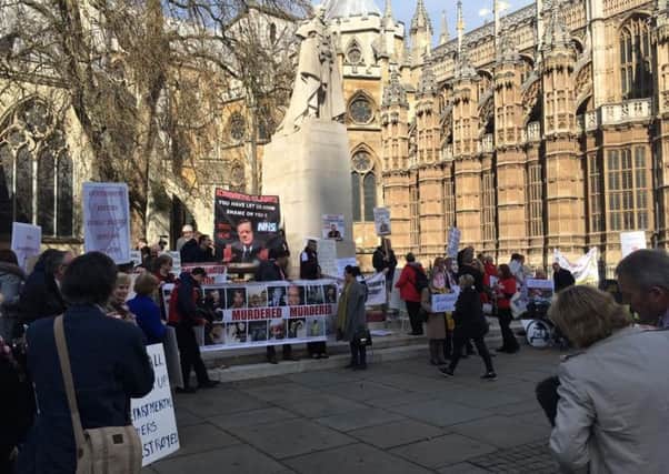 Protesters in London:  it is estimated that 2,400 people have  died due to the scandal.  Sharon has been told that the virus cleared her system naturally at some point since 1987, but that it means  an increased risk of  liver cancer.