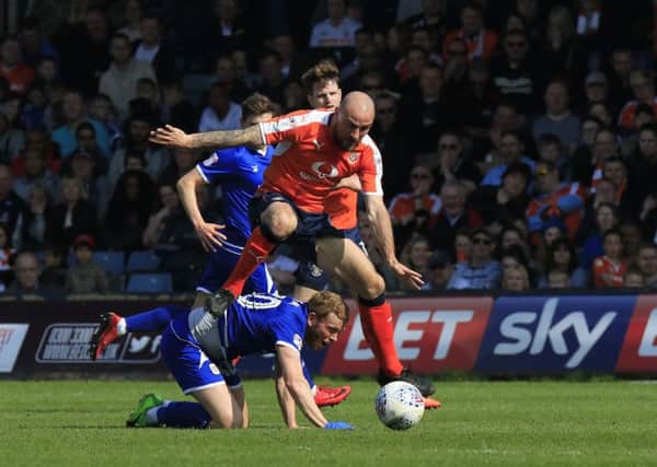 Alan McCormack hurdles a challenge against Crewe