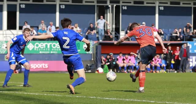 Elliot Lee curls in a wonderful goal against Crewe on Saturday