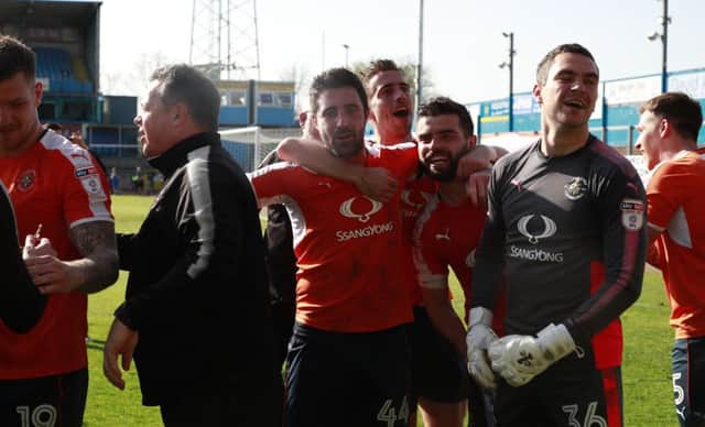 Alan Sheehan celebrates going up to League One