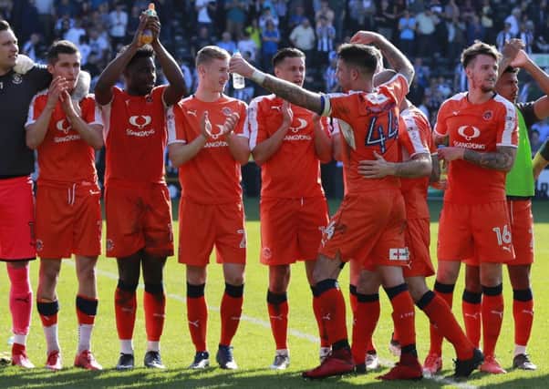 Luton's players enjoy their after match celebrations