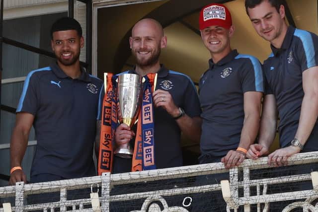 Scott Cuthbert with the League Two runners-up trophy