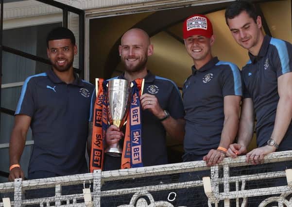 Scott Cuthbert with the League Two runners-up trophy