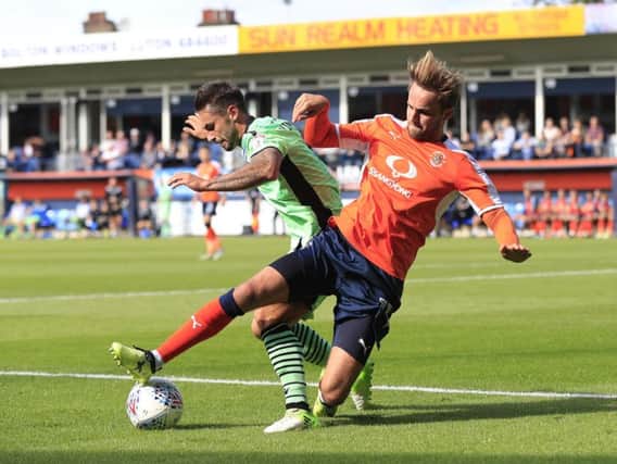 Andrew Shinnie has signed for Luton