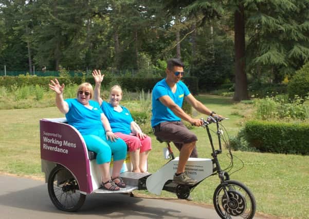 Rickshaws descended on to a park in Luton for the Young@Heart dementia cafes summer event. Photo by Vince Shrule